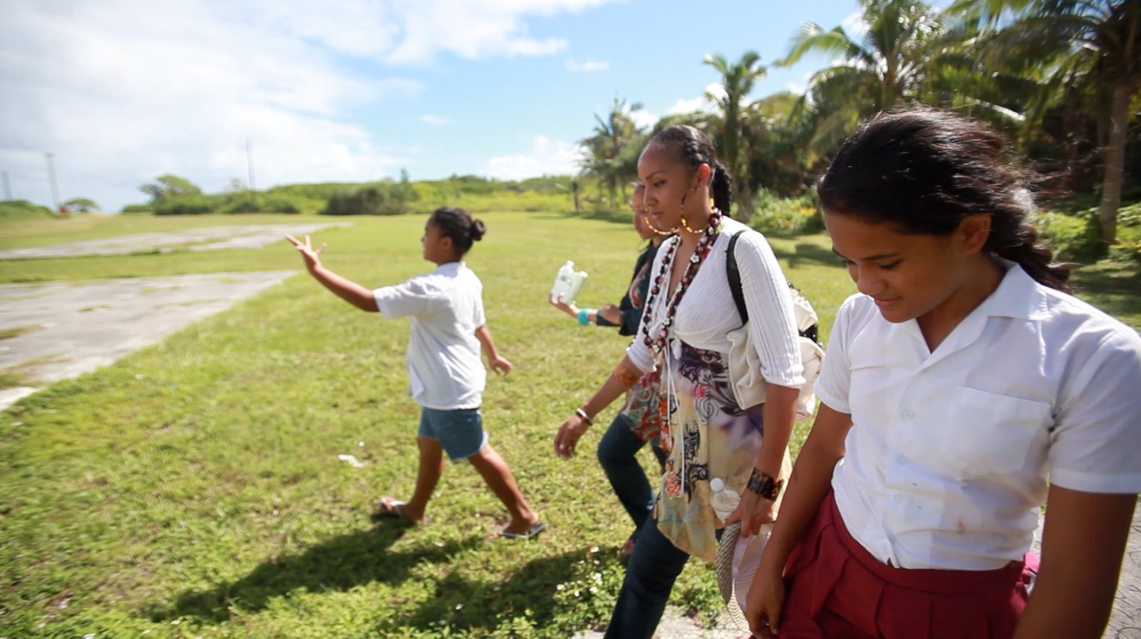 walking with children on the tiny island of Aunu'u